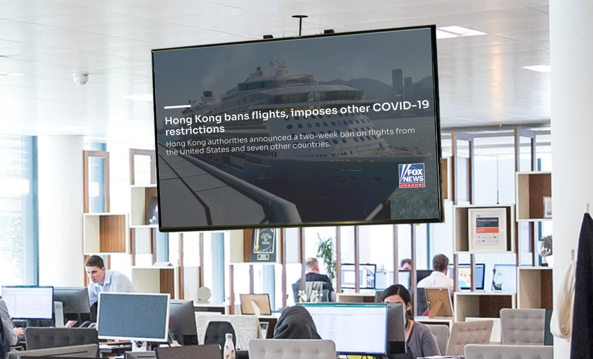 Digital signage screen hung on office working area showing Fox news feeds from Pickcel digital sigange software