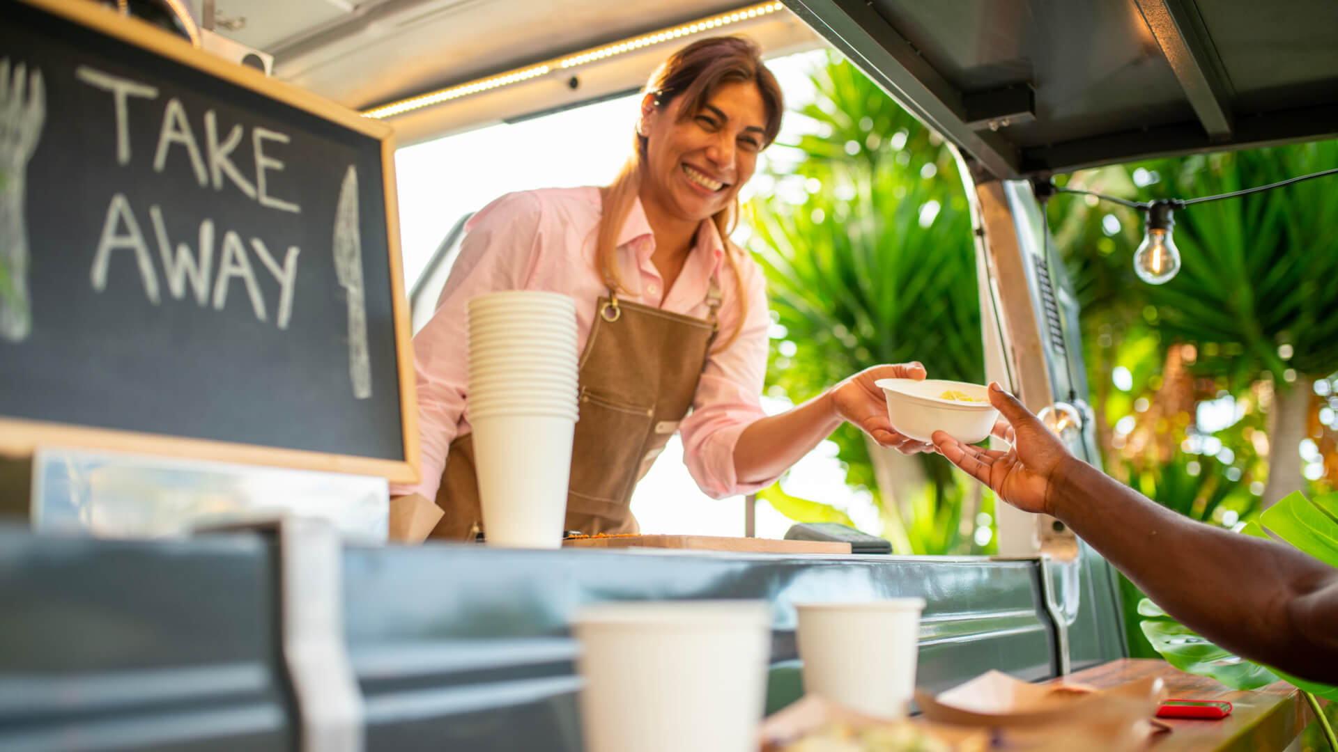 Image of a staff serving the customer