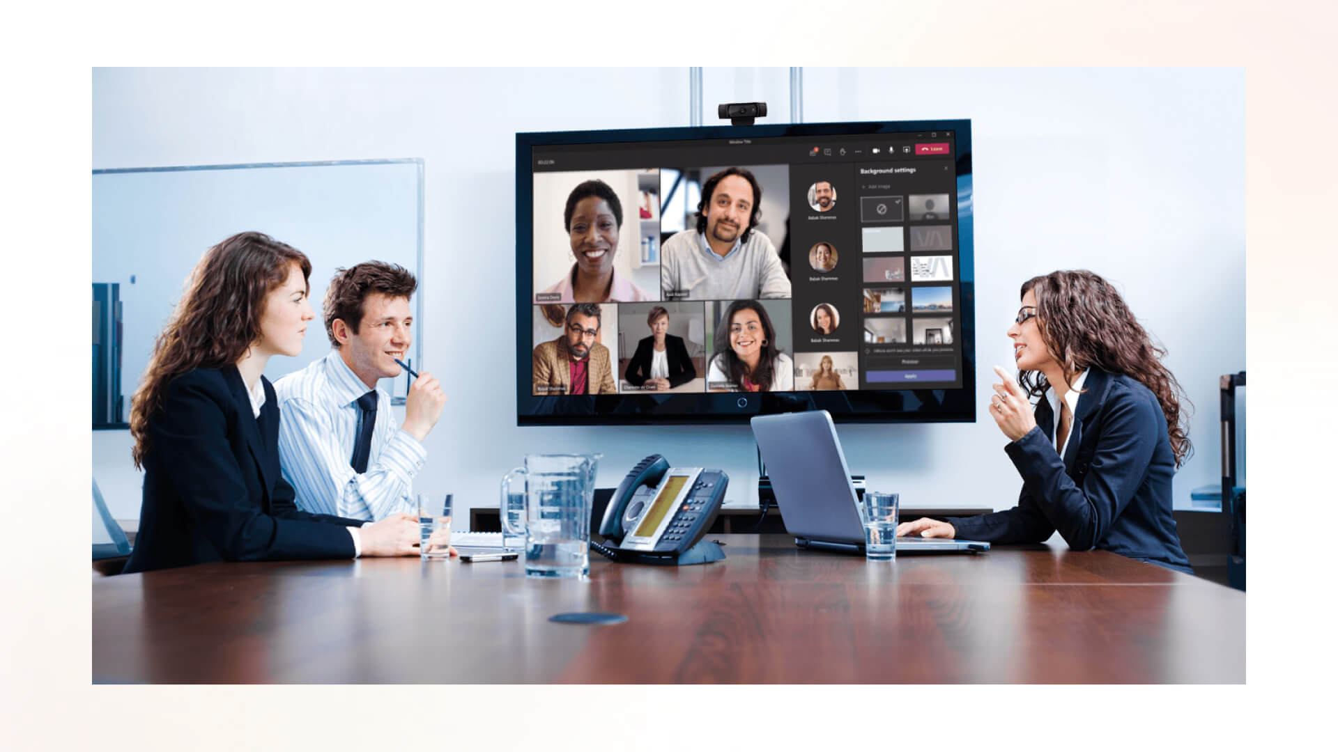 Image illustrating a group call broadcast on a digital signage screen.